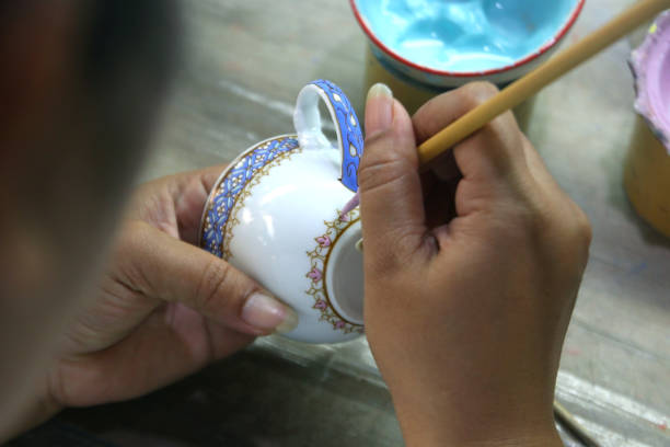 istock artist painting benjarong ceramic ware 1222656653