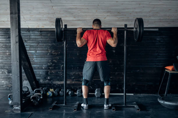 istock Sportsman Lifting Weights at the Gym 1222657423