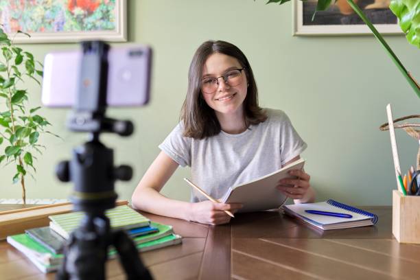 istock Girl student teenager studying online using smartphone, video conferencing 1222659289