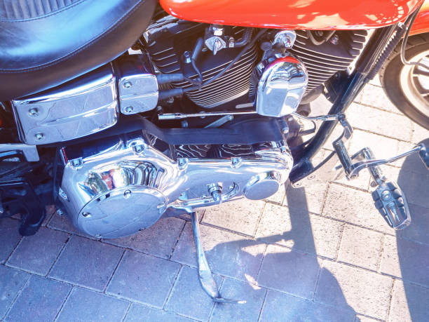 istock Closeup motorcycle engine side reflective metal. Light tinting 1222660222