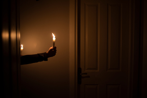 Woman hold a lighting candles