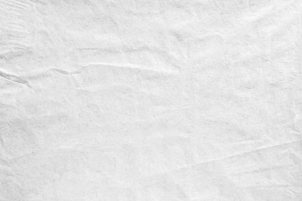 istock crumpled old pale grey kraft background paper texture 1222668654
