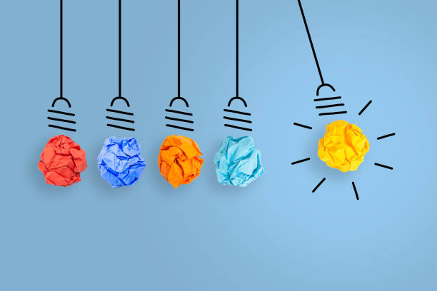 istock New Idea Concepts with Light Bulb Crumpled Paper on Blue Background 1222671244