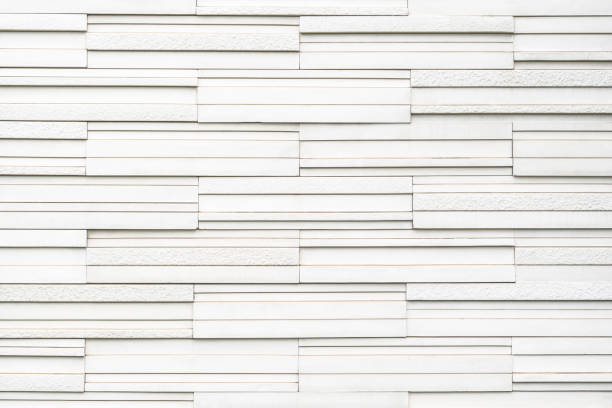 istock Granite tiled wall detailed pattern texture background in natural light white color 1222672041