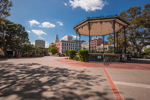 Los Angeles CA - September 29, 2019: Spanish architecture in historic center of El Pueblo de Los Angeles, Historical Monument Directory in Old Plaza, the oldest part of downtown LA. Olvera Street is a historic district in downtown Los Angeles, and a part of El Pueblo de Los Angeles Historic Monument. Los Angeles was officially founded in 1781, Olvera Street obtained its current name in 1877.