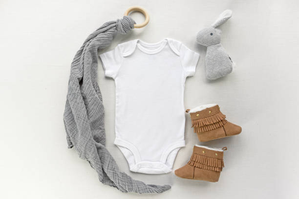 istock Blank gender neutral white baby bodysuit close up 1222680609