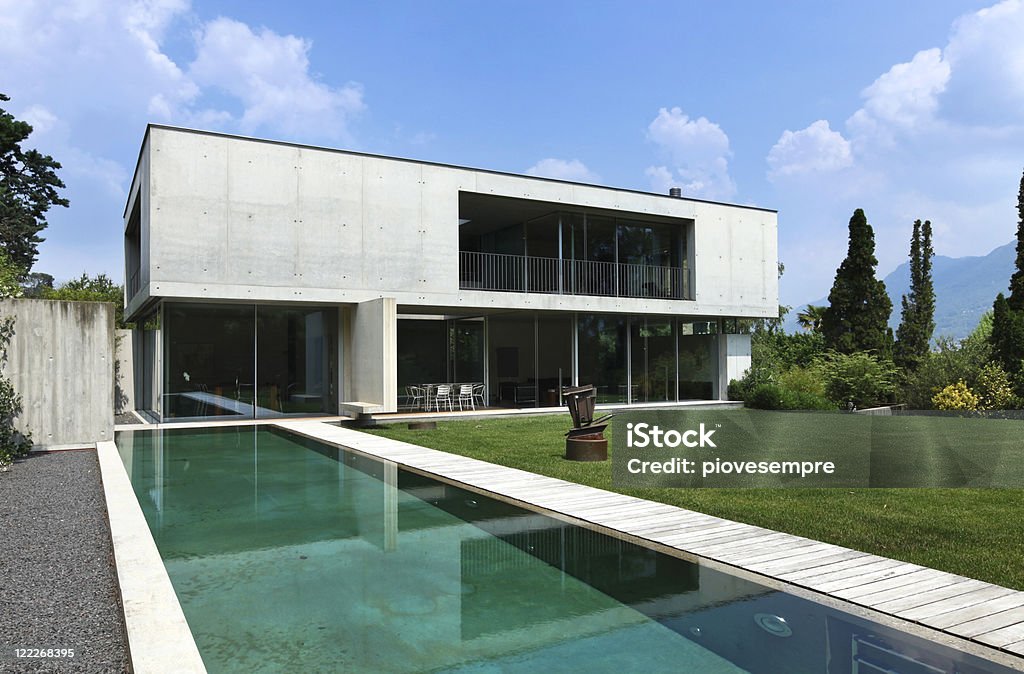 new architecture, beautiful modern house outdoors new architecture, beautiful modern house outdoors  http://i705.photobucket.com/albums/ww51/piovesempre/banner_architecture2.jpg Beauty Stock Photo