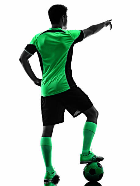 istock young soccer player man silhouette shadow isolated white background 1222684669