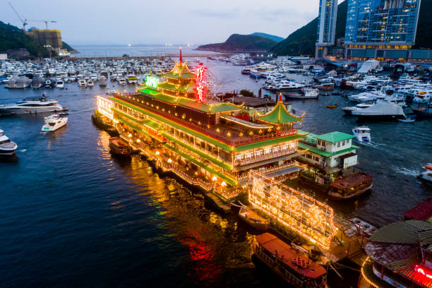 Aberdeen Harbor - Hong Kong Night view of the famous Jumbo Floating Restaurant in Aberdeen Harbor in Hong Kong. aberdeen hong kong photos stock pictures, royalty-free photos & images