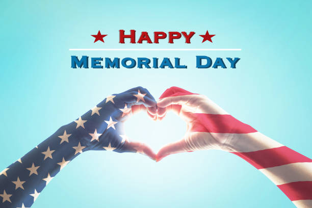 istock Happy memorial day with America flag pattern on people hands in heart shape 1222690590