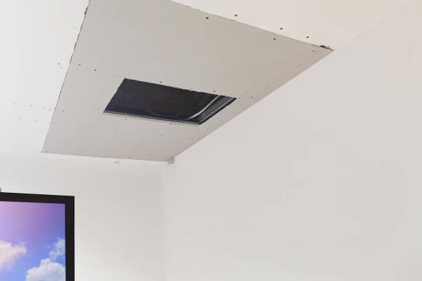 istock Rain water leaks on the ceiling causing damage, tiles and gypsum board. 1222692412
