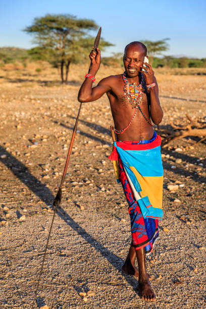 istock Samburu tribe warrior using mobile phone, central Kenya, East Africa 1222694708