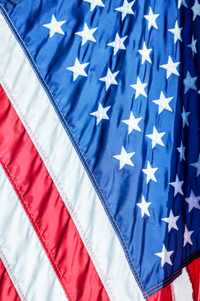 istock USA American Flag Hanging Vertically 1222698417