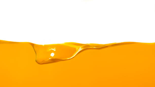 istock Orange water surface with bubble and water splash on white background 1222698545