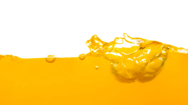 istock Orange water surface with bubble and water splash on white background 1222698581