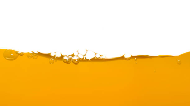 istock Orange water surface with bubble and water splash on white background 1222698585