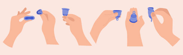 istock Menstrual cramp in period, use menstrual cup inside vagina. Zero waste feminine device. Menstuation womans period. Personal hygiene. 1222699628