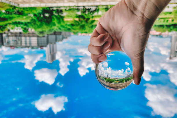 istock Scenery with blue sky cloud , building exterior and greed trees see through crystal ball 1222700240