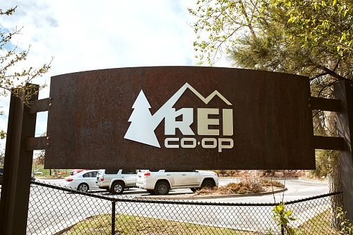 Denver, Colorado - May 1st, 2020:  Sign for REI Flagship store, temporarily closed due to Covid-19 restrictions.  Located along South Platte River and Confluence Park.