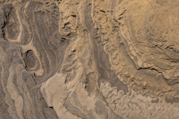 istock Texture of washed rock, stone. Orange. Wavy, for design. 1222700378