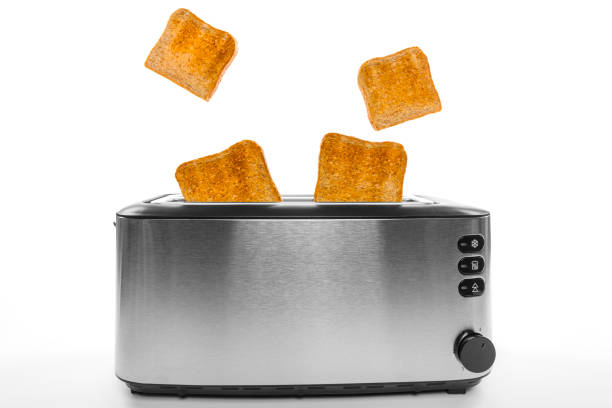 roasted toast in vintage chrome toaster. Wide angle and checkered tablecloth in reflection