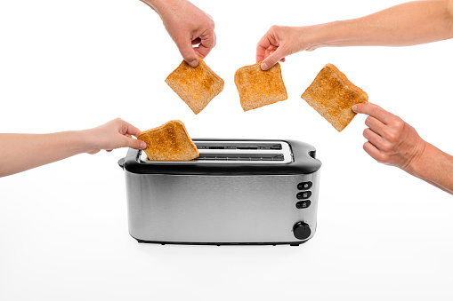 cut out hands and toaster with toastbread