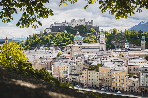 Salzburg, Austria: July 17, 2023 - The mesmerizing cityscape of Salzburg. This photo shows the Salzburg Castle overlooking the city. Photo taken during a warm summer evening.