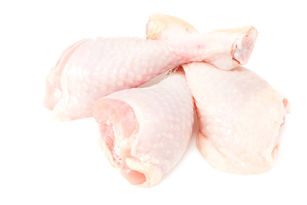 istock Raw chicken legs isolated on white background 1222707039