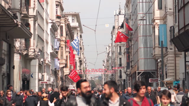 Taksim street People Walking on the Istiklal road Taksim Istanbul ,Turkey