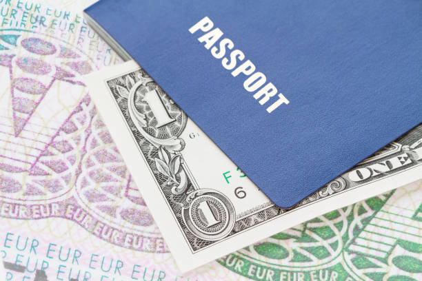 istock Blue passport with one dollar bill on the visa background. Closeup, selective focus 1222708699