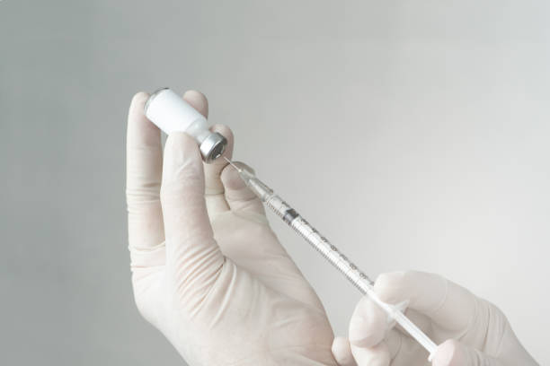 istock Vaccine and syringe injection for prevention, immunization and treatment from Covid-19 coronavirus 1222714253