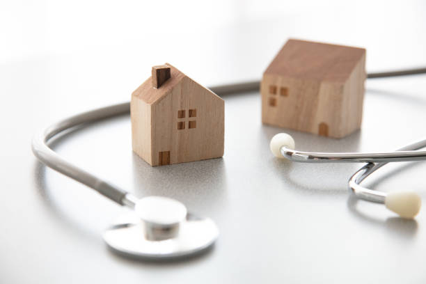 istock Miniature house and Medical stethoscope 1222717449