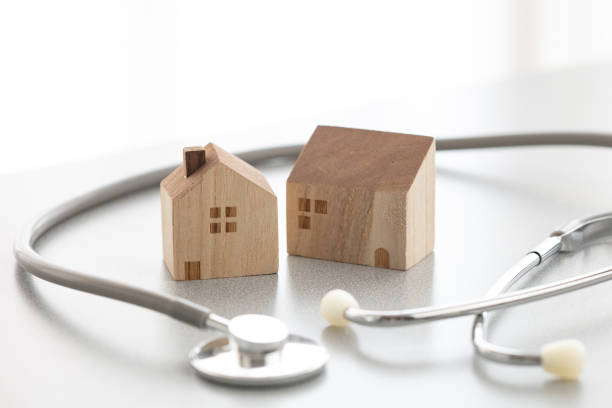 istock Miniature house and Medical stethoscope 1222717507