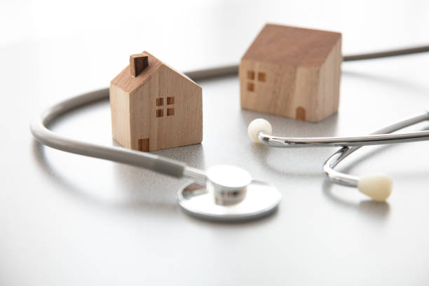 istock Miniature house and Medical stethoscope 1222717581