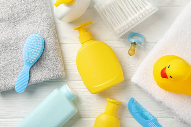 istock Baby hygiene accessories on wooden background, top view 1222723355