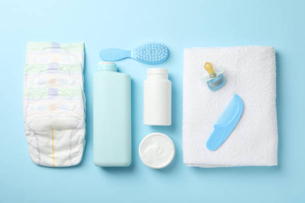 istock Flat lay with baby hygiene accessories on blue background 1222723805