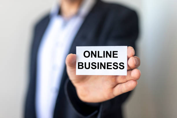 istock Online Business / Internet business concept note in hands of blurring man 1222725222