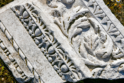 Christian Cross Carved into stone architectural detail.