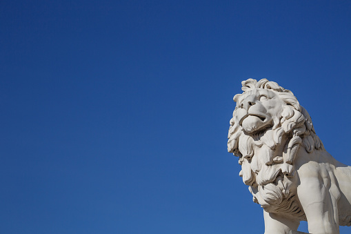 White marble lion statue, Westminster Bridge, day