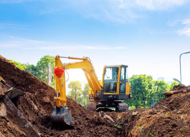 istock Excavators excavate earth at the construction site 1222727210