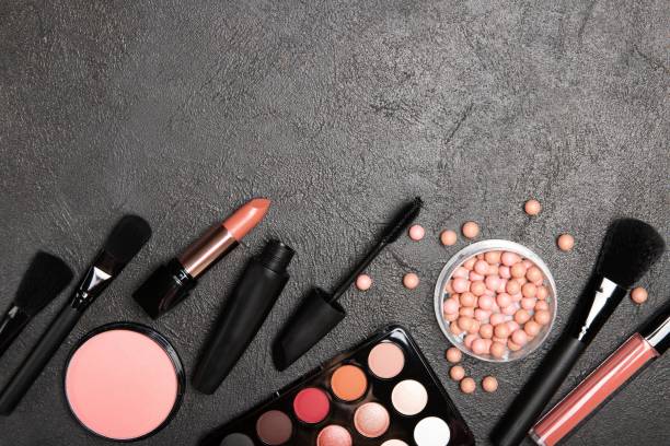 istock Set of decorative cosmetics on a black background. Place for text 1222728792