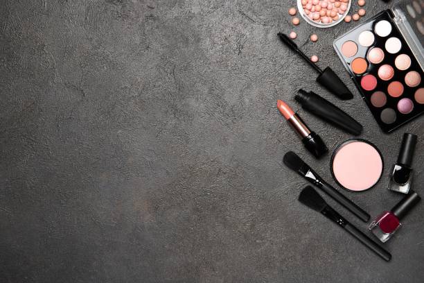 istock Set of decorative cosmetics on a black background. Place for text 1222728811