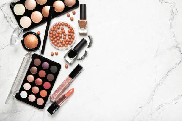 istock Frame of decorative cosmetics and accessories for makeup on grey background 1222728865