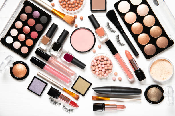 istock Decorative cosmetics and makeup brushes on a white background, top view 1222728893