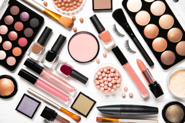 istock Decorative cosmetics and makeup brushes on a white background, top view 1222728955