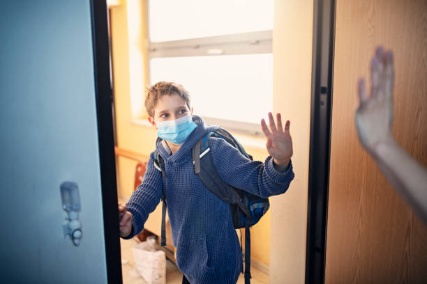 istock Little boy leaving for school during COVID-19 pandemic 1222730055