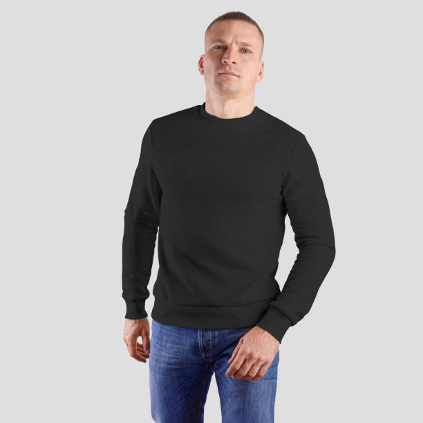 istock Template of black blank pullover on a man in blue jeans, fashionable heather for design presentation. 1222730925