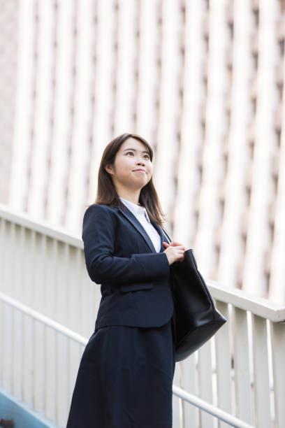 istock Asian young female college student 1222731756