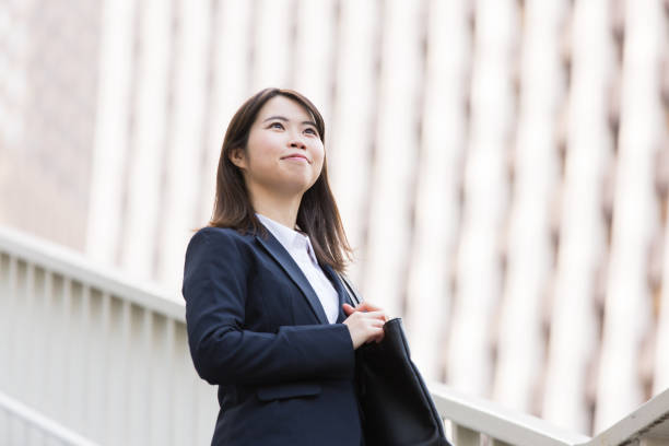 istock Asian young female college student 1222731920
