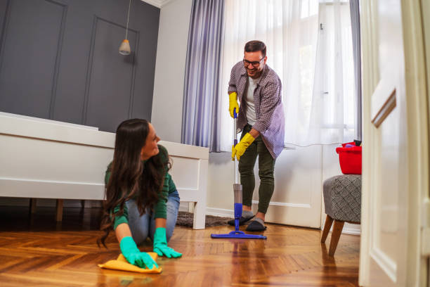 istock Couple cleaning apartment 1222735658